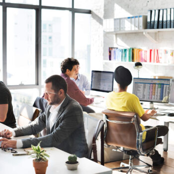 A team of employees at an accounting firm promoting their UGC SEO efforts.