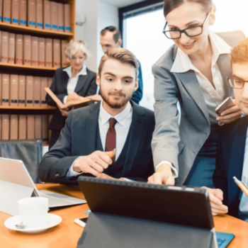 A female SEO specialist helping a CPA do keyword research and strategy.