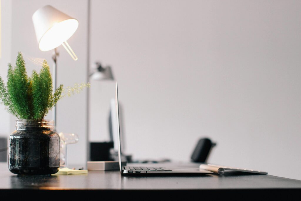 A laptop open on a desk showcasing results of organic seo traffic strategy efforts.