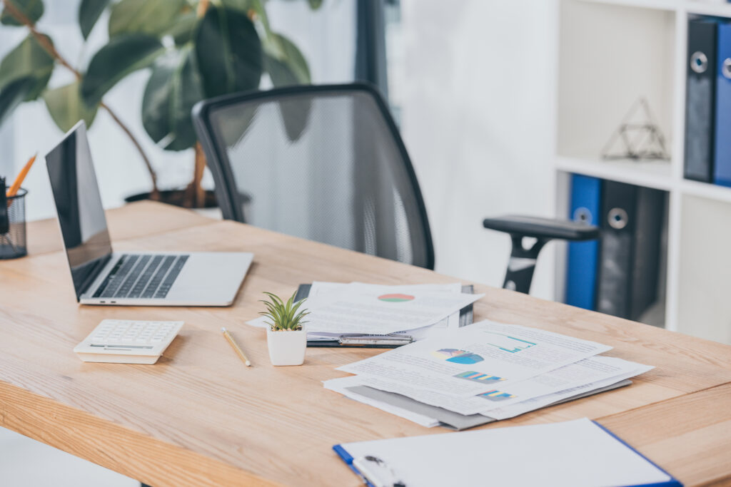 A desk with a laptop open to analytics used for accounting firm and financial services SEO.