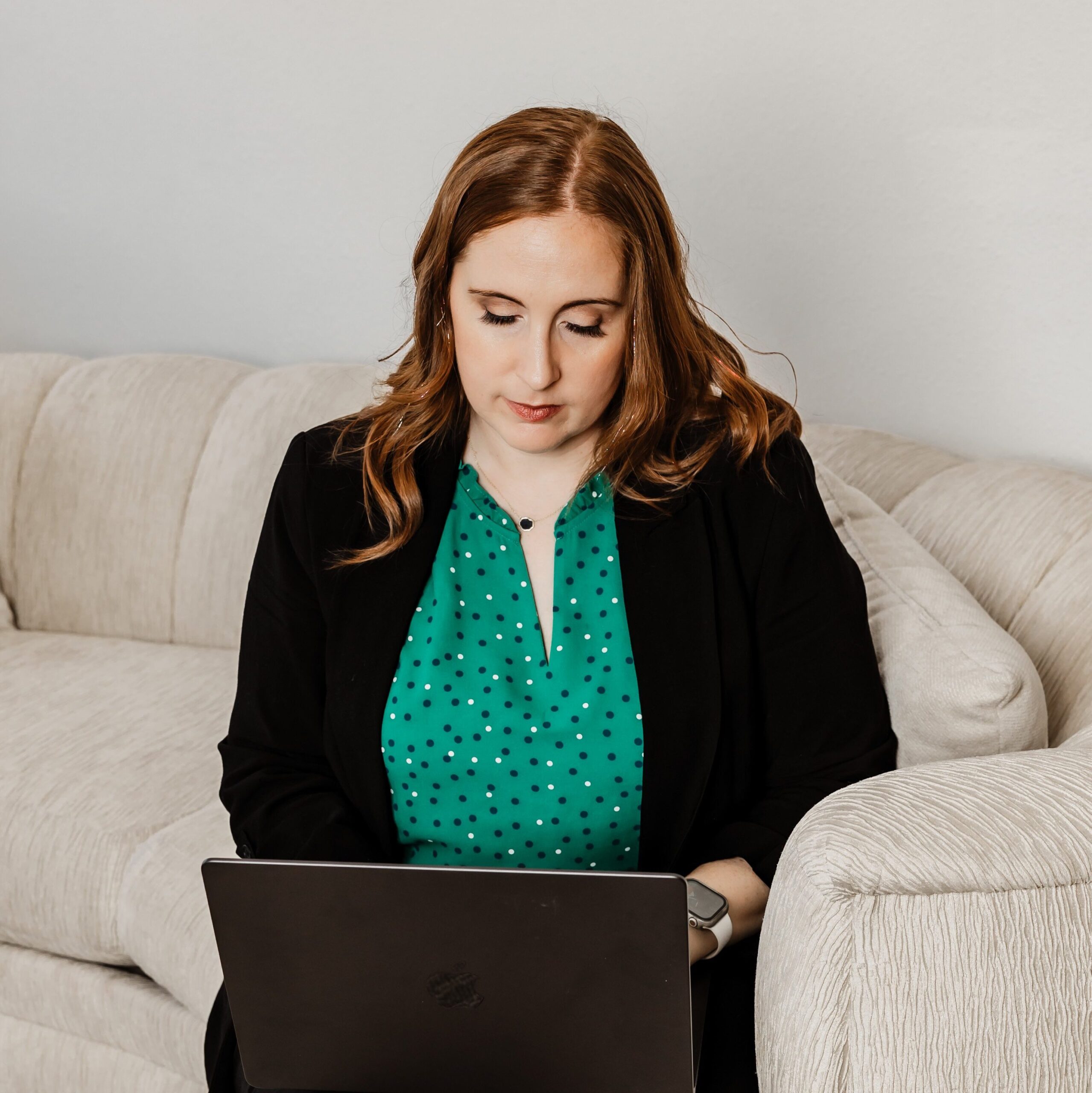 Beth Chernes an SEO Strategist is on her computer helping a CPA firm with SEO services.