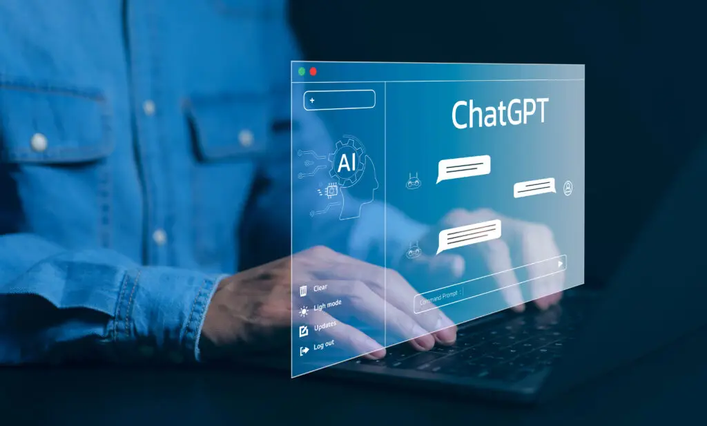 A man researching a ChatGPT SEO strategy with a pop up on his laptop showing ChatGPT.